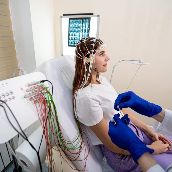Patient brain testing using encephalography at medical center Patient brain testing using encephalography at medical center.